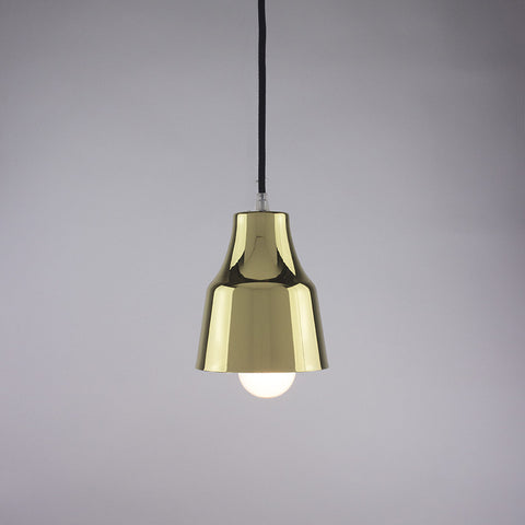 Horn shade pendant light in brass finish.